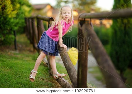 Cute Little Girl Having Fun In Lonato Del Garda, A Small Town And Comune In The Province Of Brescia,