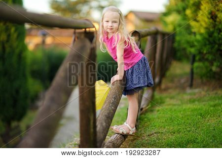 Cute Little Girl Having Fun In Lonato Del Garda, A Small Town And Comune In The Province Of Brescia,