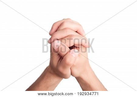 Man hands put together as if he is praying isolated on white background
