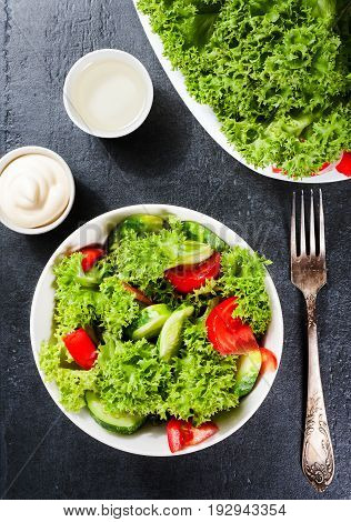 Vegetables Salad. Delicious Vegetarian Food Or Diet Concept On Dark Background