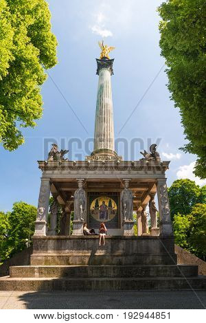 Monument And Golden Angel Of Peace In The Center Of The Capital Of Bavaria.