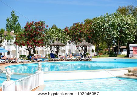 MALLORCA SPAIN - JUNE 1: The tourists enjoiying their vacation in luxury hotel on June 1 2015 in Mallorca Spain. Up to 60 mln tourists is expected to visit Spain in year 2015.