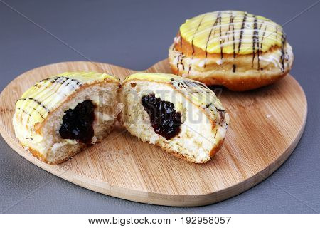 German Donuts - Berliner With Jam And Icing Sugar In A Tray On A Grey Background.