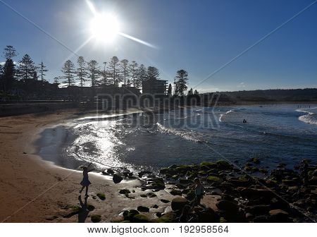 Panoramic view of Dee Why beach (Sydney NSW Australia) on a sunny day. A great place to relax as the beach is mainly frequented by locals.