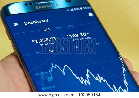 New york, USA - June 27, 2017: Growing graph of bitcoin price on mobile application coinbase