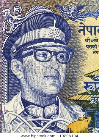 NEPAL - CIRCA 1974: Birendra Bir Bikram (1945-2001) på 1 Rupee 1974 seddel fra Nepal. Kongen af Ne