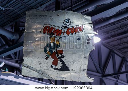 Oshkosh WI - 3 March 2017: A piece of nose art from WWII aircraft featuring Rum and Coke