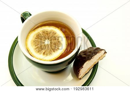Cup of tea with lemon and zephyr