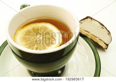 Cup of tea with lemon and zephyr