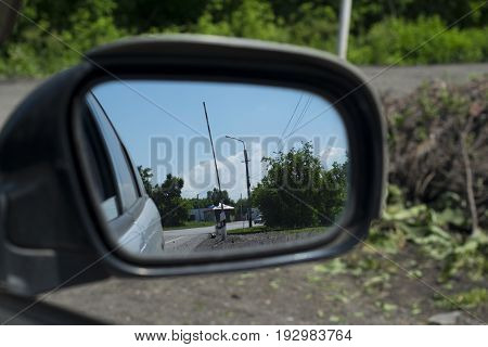 the barrier on the road the view in the mirror