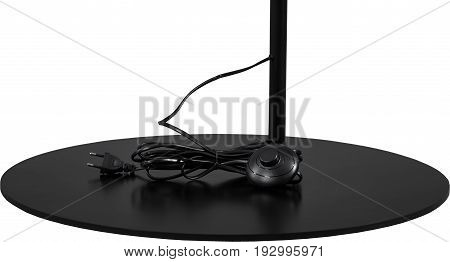 A Close Up Partial View of a Black Floor Lamp. Black part of lamp isolated on white