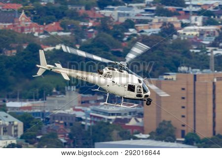 Melbourne, Australia - March 16, 2014: Eurocopter As-350ba Helicopter Conducting Aerial Filming With