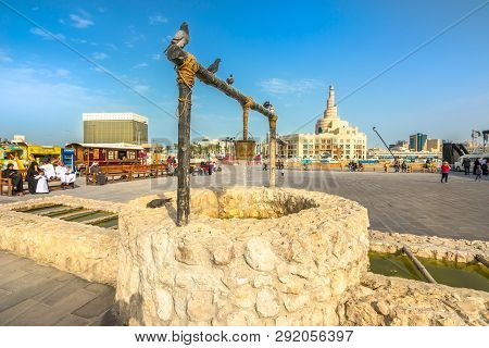 Doha, Qatar - February 20, 2019: Pigeons At Old Well Fountain, Famous Landmark At Souq Waqif. Middle