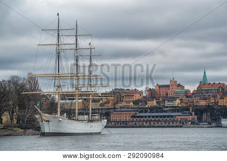 Wonderful Autumn Scenery Of The Old Town With Historcal Ship At Skeppsholmen Island In Stockholm