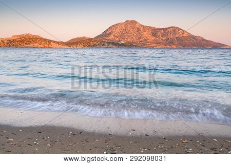 Beach In The Town Of Fourni And View Of Thymaina Island Early In The Morning, Greece.