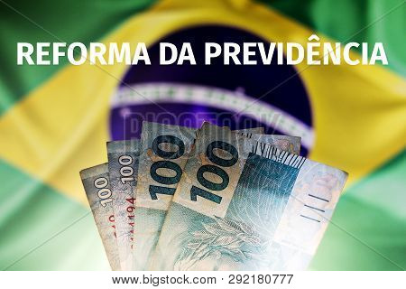 Real Notes, Brazilian Money With Brazilian Flag, Blurred In The Background. Text Written Above 