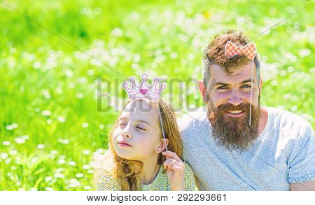Family Spend Leisure Outdoors, Play Girlish Games. Child And Father Posing With Crown And Bow Photo 