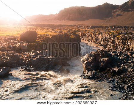 Wild Icelandic River Full Of Muddy Water
