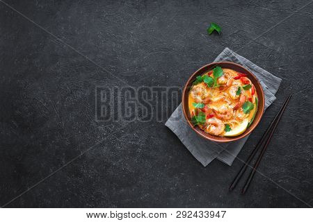 Laksa Shrimp Soup. Prawn Noodle Laksa Soup On Black Background, Top View, Copy Space. Asian Malaysia