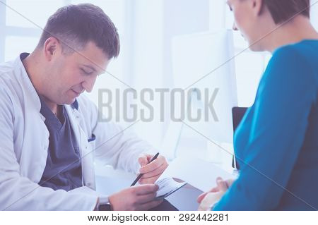 The Patient And His Doctor In Medical Office