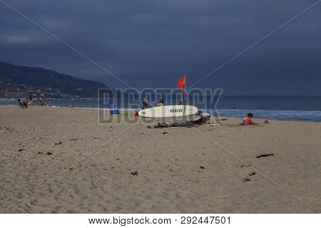 Los Angeles, United States, 05/15/2016. People Relaxing On Malibu Beach
