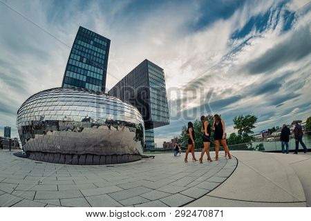 Duesseldorf, Germany - June 29, 2016: Four Unidentified Female Models Pose During A Photo Shooting W