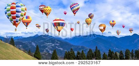 Colorful Hot Air Balloon Fly Over Panorama Nature Landscape Of Mountain View From Cingjing Farm, Nan