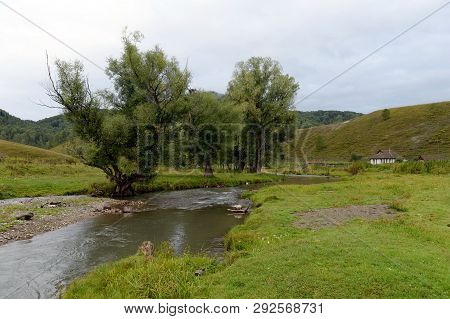 The Mountain River Yarovka In The Village Of Generalka Of The Altai Territory. Western Siberia. Russ