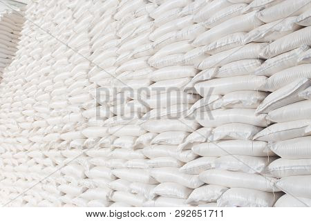 Theme Industry And Economics, Stocks In Stock.a Lot Of White Fabric Bags Close-up With Loose Product