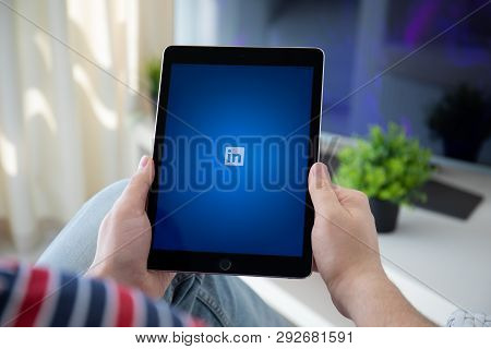 Anapa, Russia - March 29, 2019: Man Holding Ipad Pro With Social Network Service Linkedin On The Scr