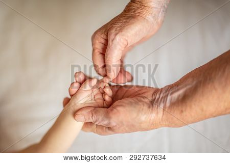 Hands Closeup. Mom And Her Child. Happy Family Concept. Beautiful Conceptual Image Of Maternity. Han