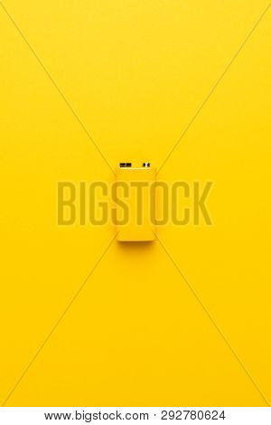Blank Nine-volt Battery On The Yellow Background