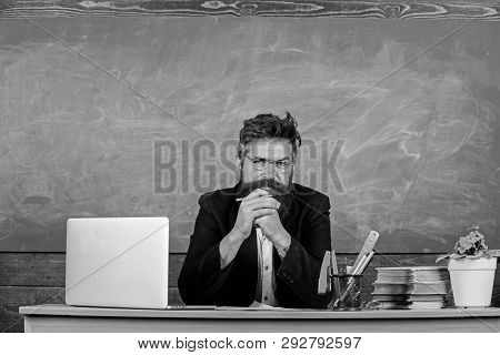 Teacher Bearded Mature Schoolmaster Listening With Attention. Teacher Formal Wear Sit At Table Class