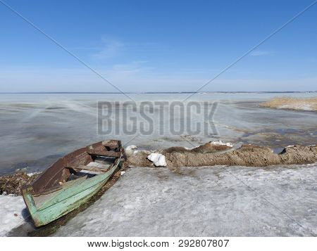 Boat In Winter On The Shores Of Lake Pleshcheyevo, Pereslavl Zalessky, Yaroslavl Region, Russia On A