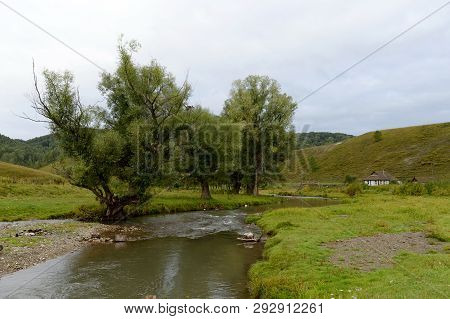The Mountain River Yarovka In The Village Of Generalka Of The Altai Territory. Western Siberia. Russ