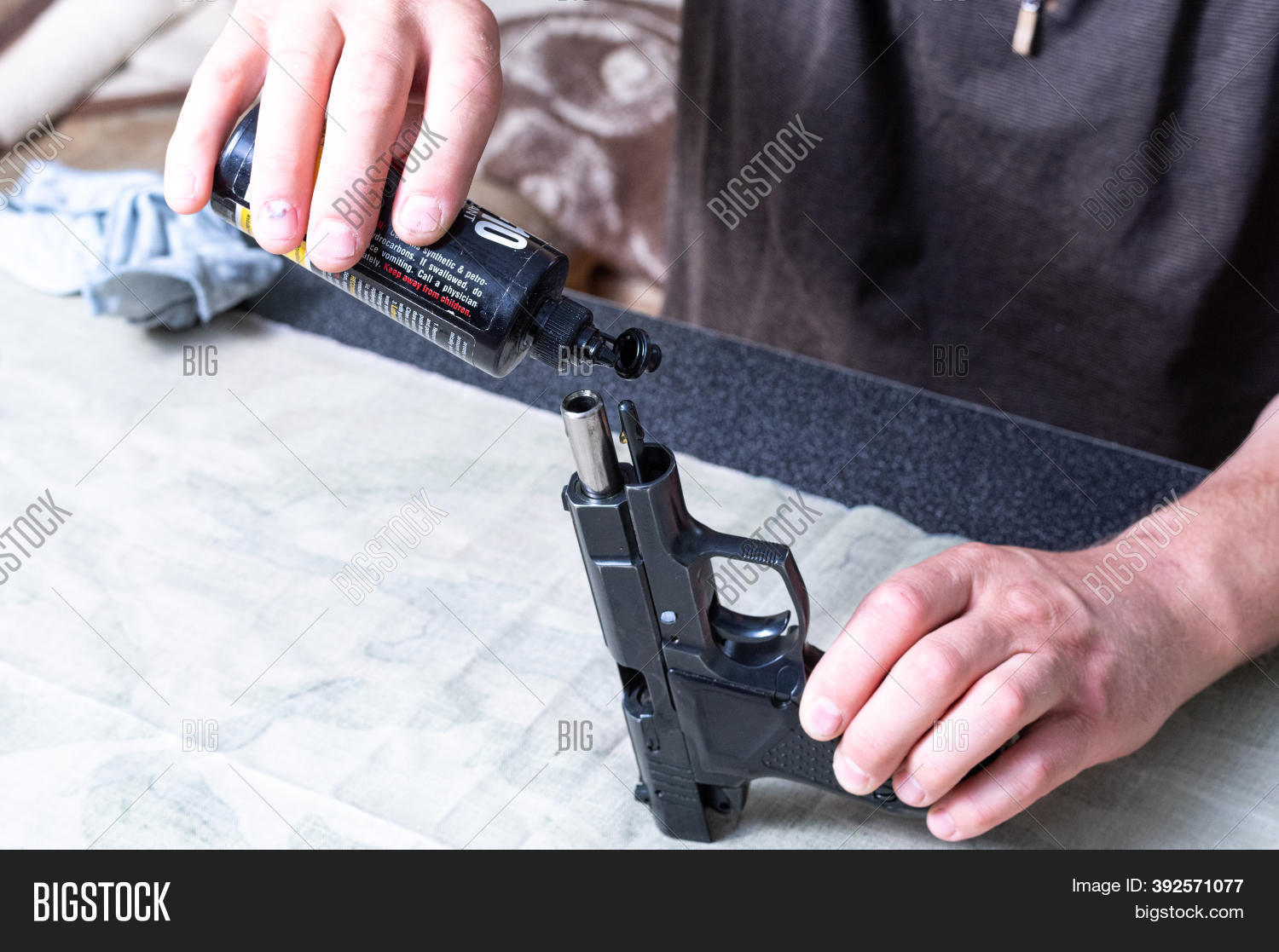 Pour Oil Into Gun. Gun Image & Photo (Free Trial) Bigstock