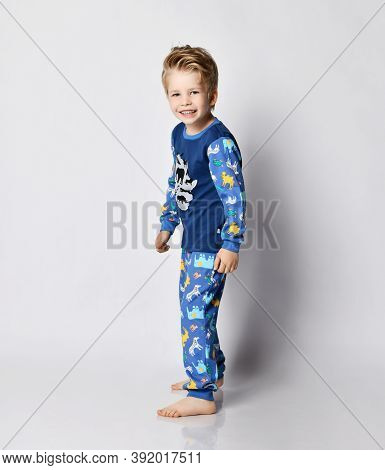 Frolic Smiling Blond 5-6 Y.o. Kid Boy In Pyjamas With African Animals Pattern And Map Print Stands S