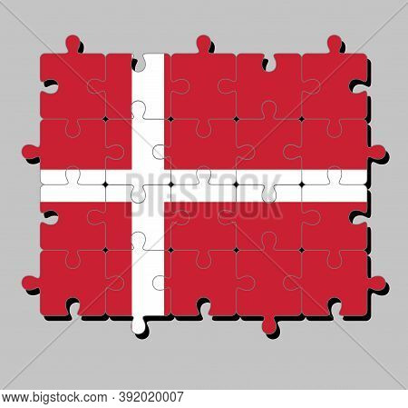 Jigsaw Puzzle Of Denmark Flag In Red With A White Scandinavian Cross That Extends To The Edges Of Th