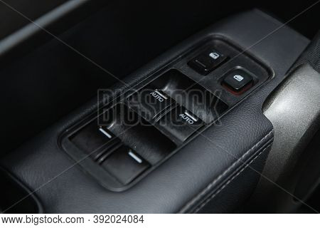 Novosibirsk, Russia - October 22, 2020:  Honda Cr-v, Interior Of Modern Car. Side Door Buttons: Wind