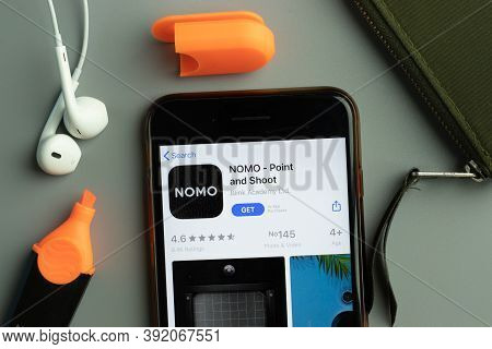 New York, Usa - 26 October 2020: Nomo Point And Shoot Mobile App Icon Logo On Phone Screen Close-up,