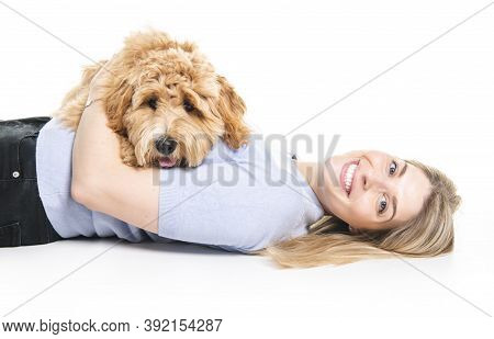 Woman With His Golden Labradoodle Dog Isolated On White Background