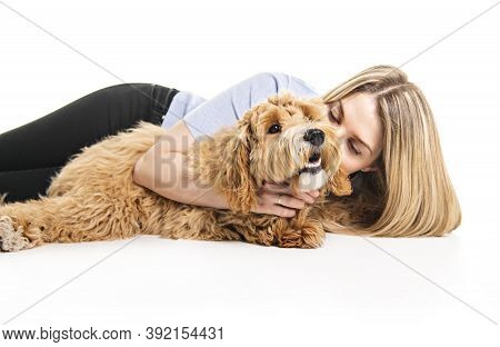 Woman With His Golden Labradoodle Dog Isolated On White Background
