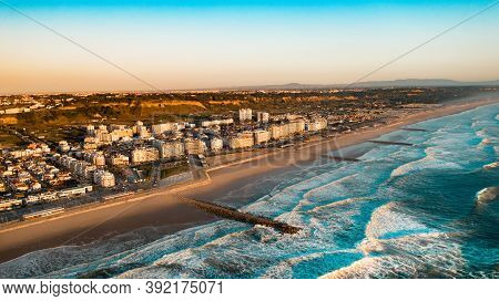 The Aerial Footage Of Costa Da Caparica Coastline Of Glorious Sandy Beaches, Powerful Atlantic Waves
