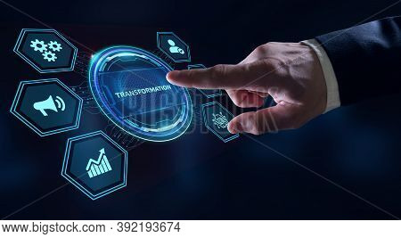 Business, Technology, Internet And Network Concept. Businessman Presses Button Transformation On Vir