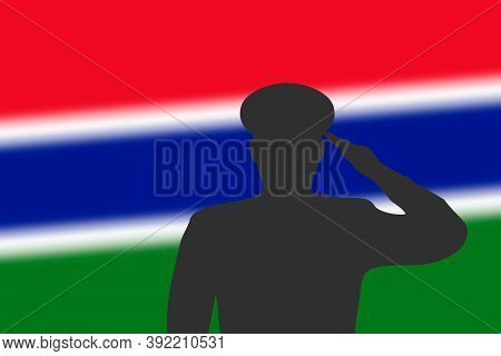 Solder Silhouette On Blur Background With Gambia Flag.