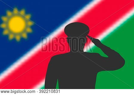 Solder Silhouette On Blur Background With Namibia Flag.