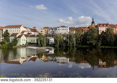 Colorful Medieval Town Pisek Above The River Otava With The Deanery Church, Czech Republic