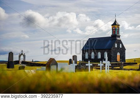 Hvalsneskirkja Church With A Cemetery Located Near The Village Of Sandgerdi In Iceland.