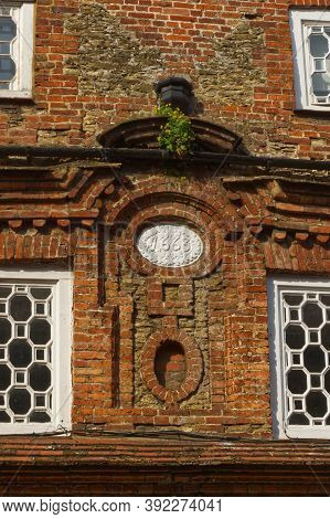 Detail Of Architecture Of Old Buildings In Shopping Street, Godalming, Surrey, England