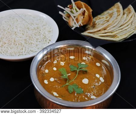 Butter Chicken Curry With Basmati Rice And Indian Bread